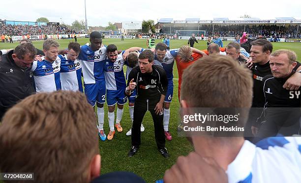 Bristol manager Darrell Clarke speaks with his players during the Vanarama Football Conference League Play Off Semi Final Second Leg between Bristol...