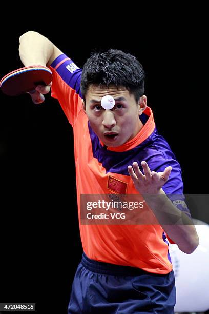 Fang Bo of China competes against Ma Long of China during men's singles final match on day eight of the 2015 World Table Tennis Championships at the...