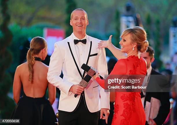 Shelley Craft and Jules Lund arrive at the 57th Annual Logie Awards at Crown Palladium on May 3, 2015 in Melbourne, Australia.