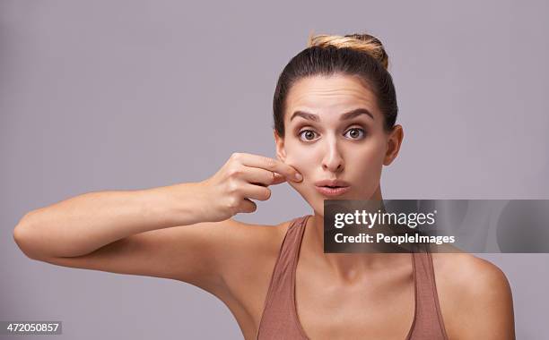 cheeky! - pinching stock pictures, royalty-free photos & images