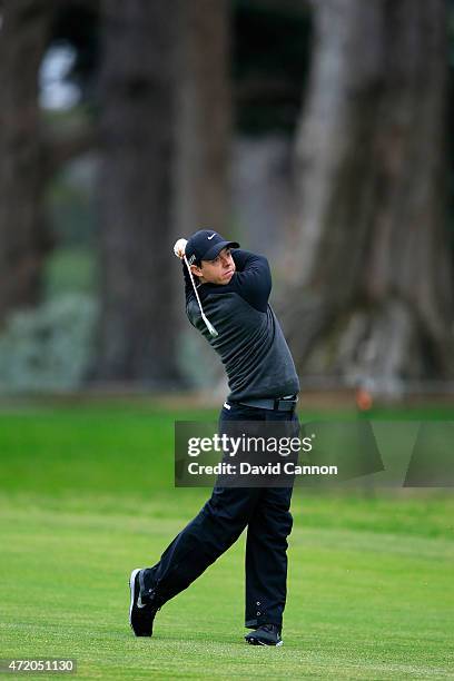 Rory McIlroy of Northern Ireland hits his second shot on the first hole during his semi final match against Jim Furyk in the World Golf Championships...