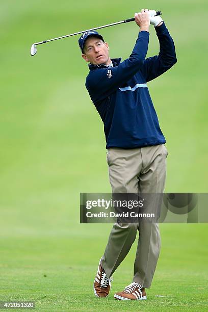 Jim Furyk hits his third shot on the first hole during his semi final match against Rory McIlroy of Northern Ireland in the World Golf Championships...