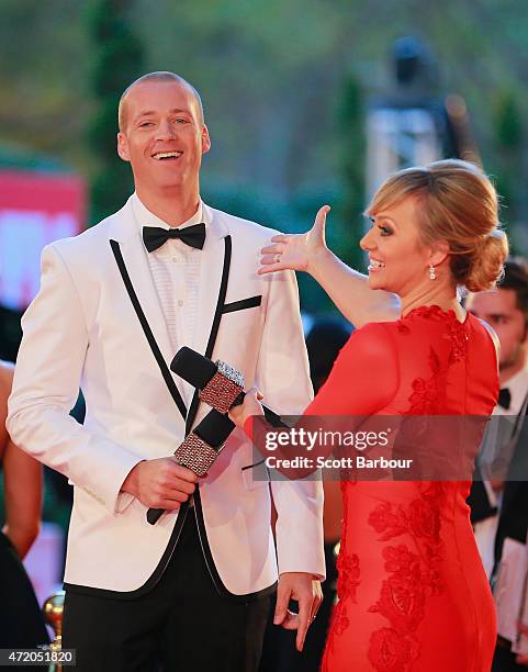 Shelley Craft and Jules Lund arrive at the 57th Annual Logie Awards at Crown Palladium on May 3, 2015 in Melbourne, Australia.