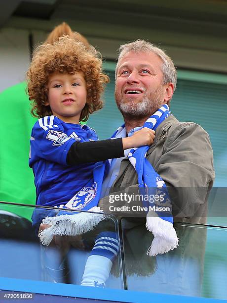 Chelsea owner Roman Abramovich looks on as Chelsea win the Premier League title after the Barclays Premier League match between Chelsea and Crystal...