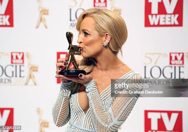 Carrie Bickmore poses in the awards room after winning the Gold Logie for Most Popular Personality On TV at the 57th Annual Logie Awards at Crown...