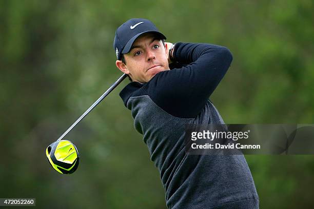 Rory McIlroy of Northern Ireland hits his tee shot on the fourth hole during his semi final match in the World Golf Championships Cadillac Match Play...