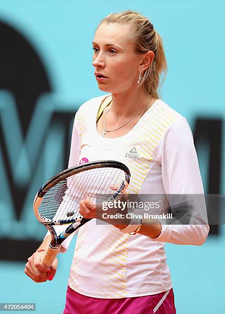 Olga Govortsova of Belarus shows her emotions against Petra Kvitova of the Czech Republic in their first round match during day two of the Mutua...