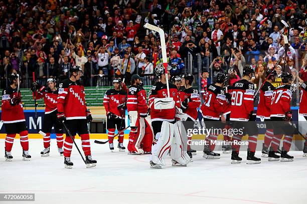 The team of Canada celebrate after the IIHF World Championship group A match between Canada and Germany on May 3, 2015 in Prague, Czech Republic.