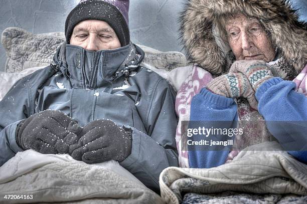 Miserable January 4,322 Old Couple Cold Stock Photos, High-Res Pictures, and Images ...