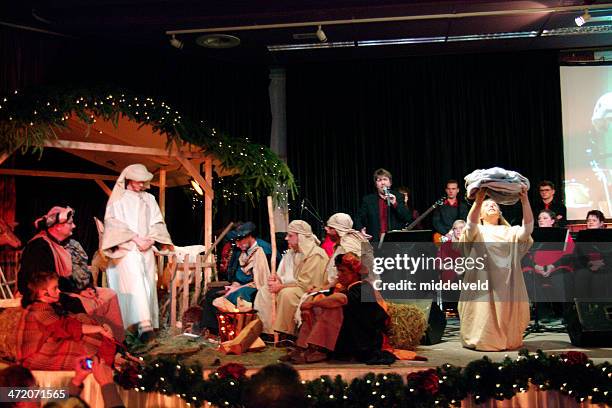christmas with nativity scene - protestant families acting stock pictures, royalty-free photos & images
