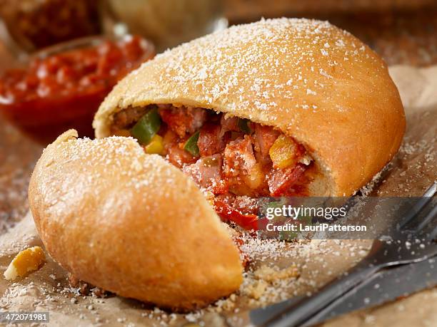 calzone or pizza pocket - calzone stock pictures, royalty-free photos & images