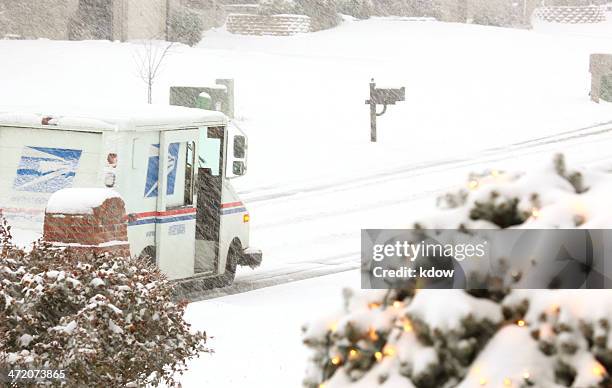 united states postal service van in snow - mailman snow stock pictures, royalty-free photos & images