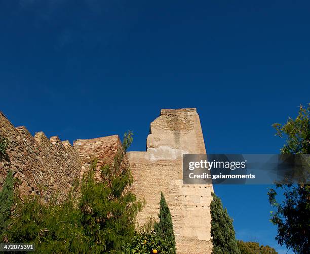 alcazaba fortified wall - alcazaba of málaga stock pictures, royalty-free photos & images