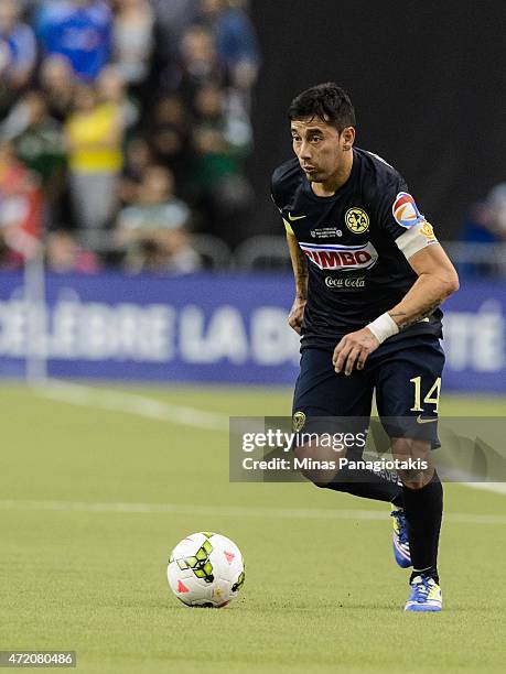 Rubens Sambueza of Club America looks to play the ball in the 2nd Leg of the CONCACAF Champions League Final against the Montreal Impact at Olympic...