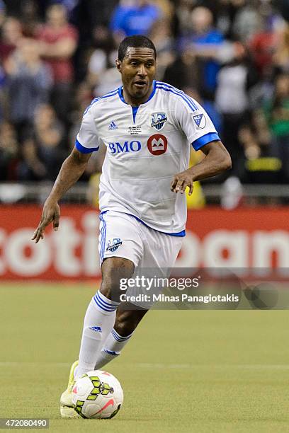 Patrice Bernier of the Montreal Impact moves the ball in the 2nd Leg of the CONCACAF Champions League Final against Club America at Olympic Stadium...