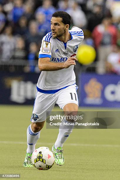 Dilly Duka of the Montreal Impact moves the ball in the 2nd Leg of the CONCACAF Champions League Final against Club America at Olympic Stadium on...