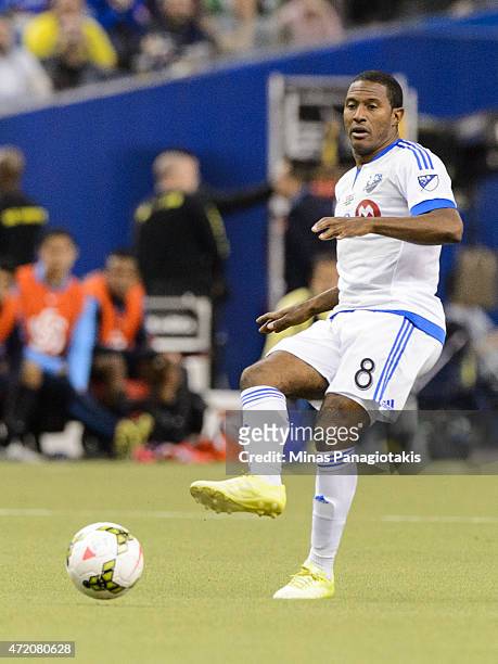 Patrice Bernier of the Montreal Impact passes the ball in the 2nd Leg of the CONCACAF Champions League Final against Club America at Olympic Stadium...
