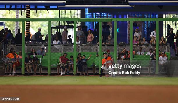 Ichiro Suzuki of the Miami Marlins stretches during the sixth inning of the game against the Philadelphia Phillies at Marlins Park on May 3, 2015 in...