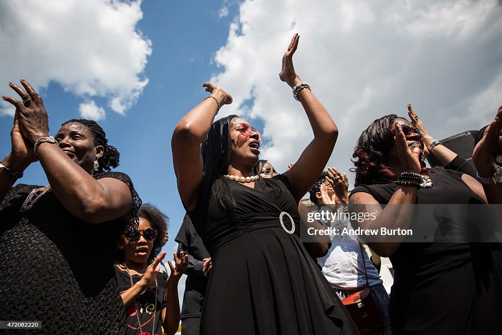 Activists Rally At Baltimore City Hall