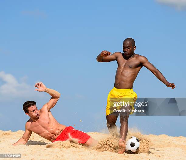 beach soccer - beach football stock pictures, royalty-free photos & images