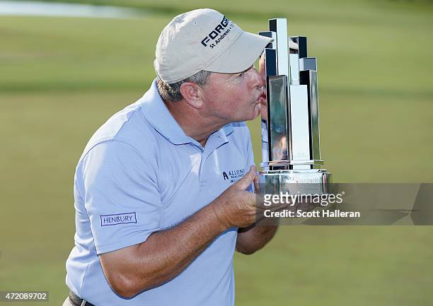 Ian Woosnam of Wales kisses the trophy after winning the Insperity Invitational at The Woodlands CC on May 3, 2015 in The Woodlands, Texas.