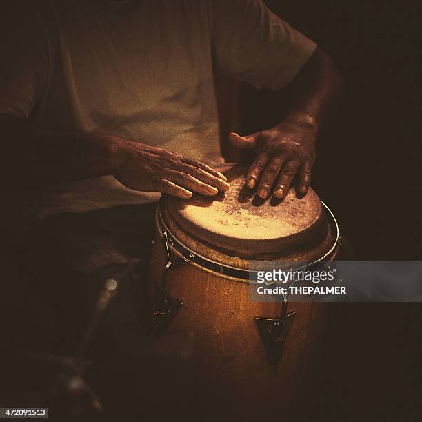 playing congas - african music stock pictures, royalty-free photos & images