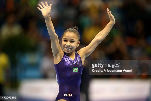 Flavia Saraiva of Brazil celebrates after competes on the Floor during day two of the Gymnastics World Challenge Cup Brazil 2015 at Ibirapuera...