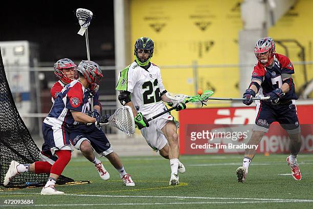 Scott McWilliams of the Boston Cannons defends against Ned Crotty of the New York Lizards at Gillette Stadium on May 3, 2015 in Foxboro,...
