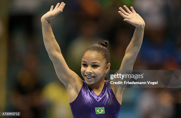 Flavia Saraiva of Brazil celebrates after competes on the Floor during day two of the Gymnastics World Challenge Cup Brazil 2015 at Ibirapuera...