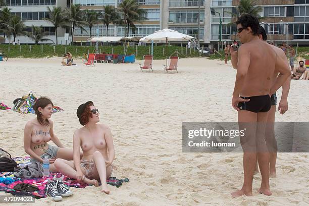 topless in ipanema beach - bare beach stock pictures, royalty-free photos & images