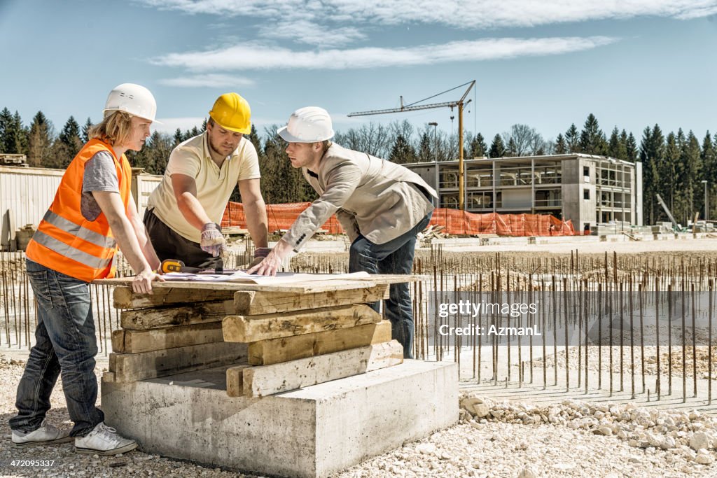 Architect explaining blueprints