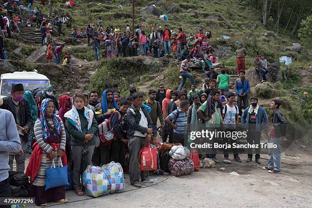 Nepali victims of the earthquake queue to take a military helicopter from their homes on May 1, 2015 in Kodari, Nepal. The road from Bahrabise to...