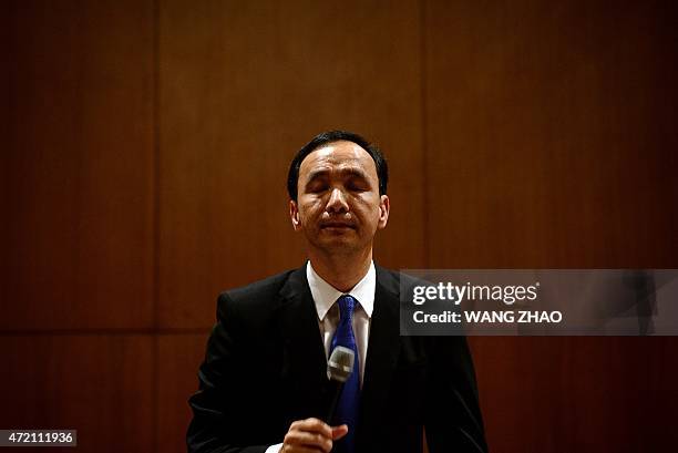 Eric Chu, chairman of Taiwan's ruling Kuomintang party prepares to answer a question during a press conference at a hotel in Beijing on May 4, 2015....