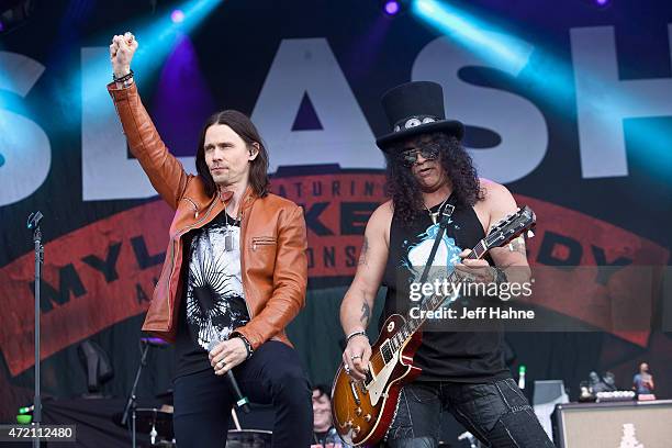 Singer Myles Kennedy and guitarist Slash of Slash featuring Myles Kennedy and the Conspirators performs during day 2 of the Carolina Rebellion at...