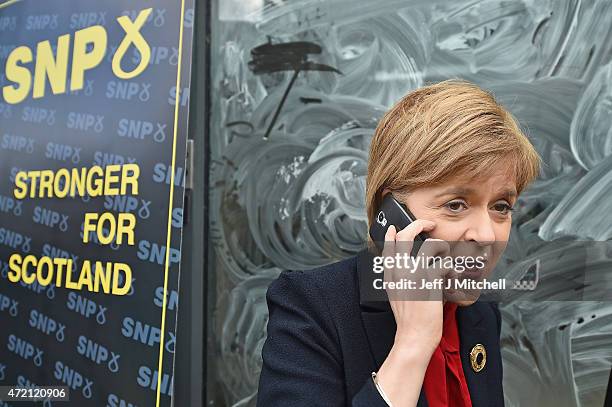 First Minister and leader of the SNP Nicola Sturgeon meets members of the public during campaigning on, May 3, 2015 in Kirkcaldy, Scotland. With four...