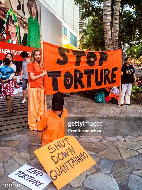 people requiring guantanamo prison shut down,  honolulu, usa - female torture stock pictures, royalty-free photos & images