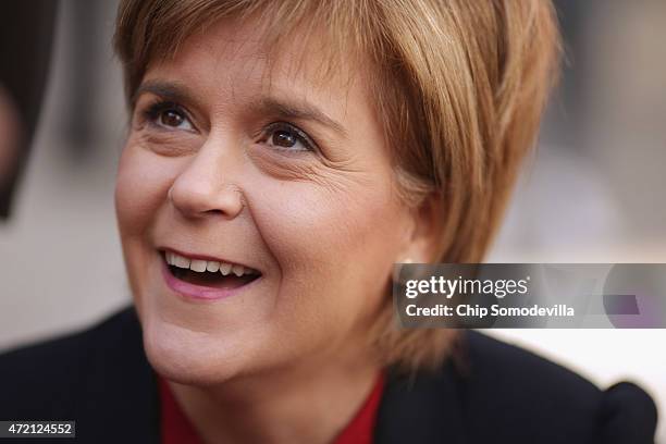 First Minister and leader of the Scottish National Party Nicola Sturgeon meets members of the public while campaigning for SNP candidate Roger Mullin...