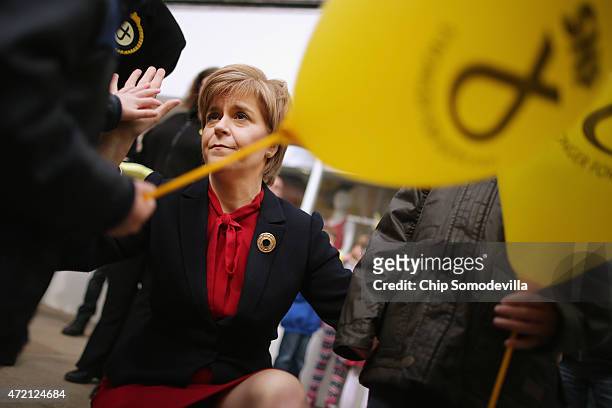 First Minister and leader of the Scottish National Party Nicola Sturgeon meets members of the public while campaigning for SNP candidate Roger Mullin...