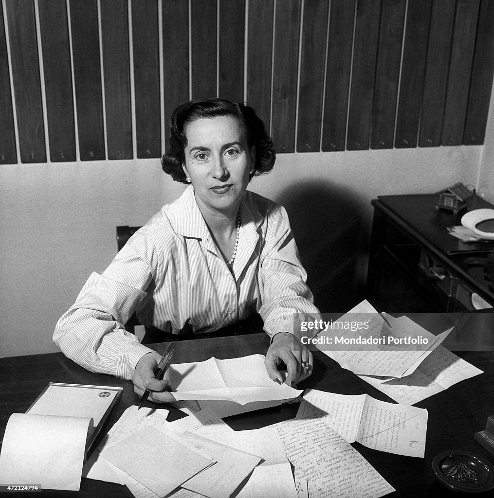 Camilla Cederna works at her desk