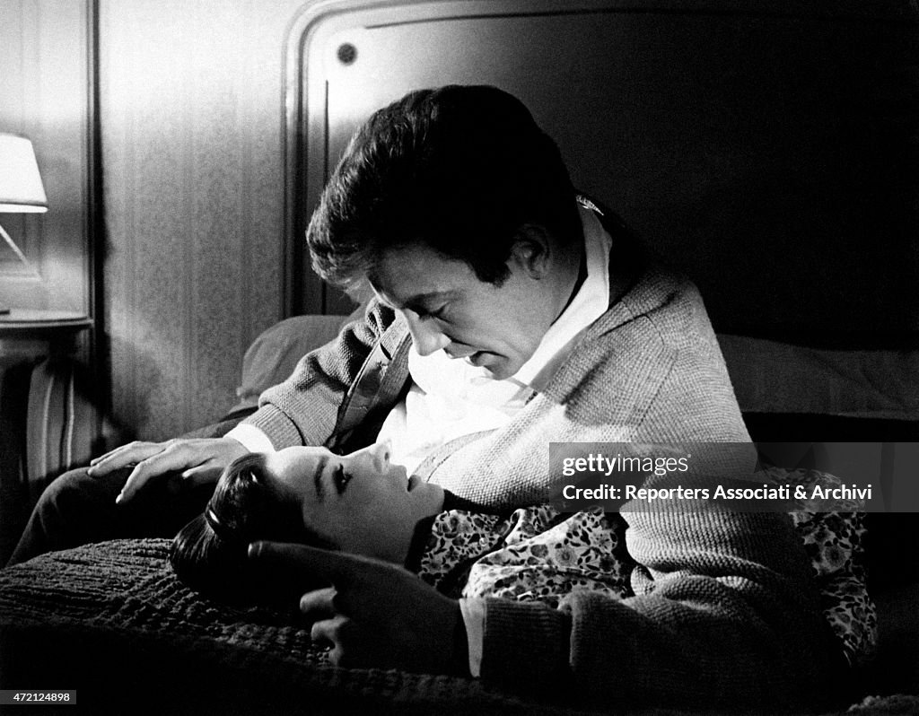 Audrey Hepburn and Albert Finney, lying in bed, shoot a romantic scene