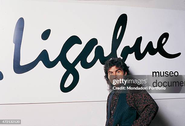 "Italian singer-songwriter Luciano Ligabue posing in front of the banner of the Museo documentario e Centro Studi Antonio Ligabue at the Palazzo...