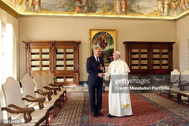 "Pope Francis welcoming the President of the Republic of Latvia Andris Berzins at the private library of the Apostolic Palace. Vatican City, 20th...