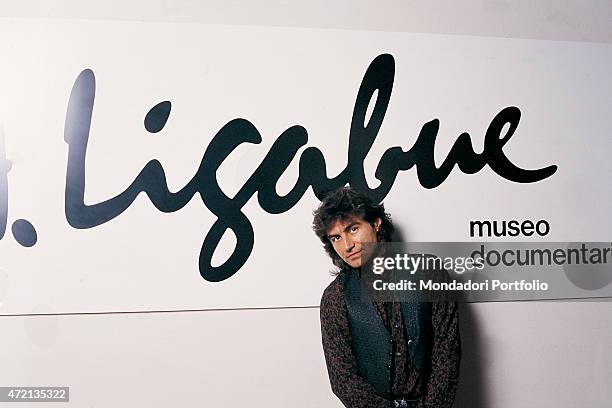 "Italian singer-songwriter Luciano Ligabue posing in front of the banner of the Museo documentario e Centro Studi Antonio Ligabue at the Palazzo...