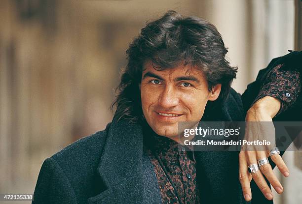 "Portrait of Italian singer-songwriter Luciano Ligabue posing with a leaning arm in a photocall shooted in his town. Correggio , December 1991 "