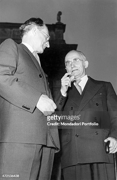"The President of the Council of Ministers of the Italian Republic Alcide De Gasperi talking to the President of the Italian Republic Luigi Einaudi....