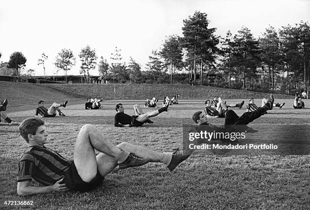 "Italian football players Gianni Rivera, Roberto Anzolin, Mario Bertini, Spartaco Landini and Giacinto Facchetti training in Milanello, the training...