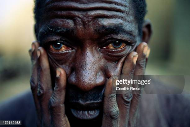 Kibuye, Rwanda. Portrait of an Hutu refugee, traumatized by the 1994 Rwandan Genocide.