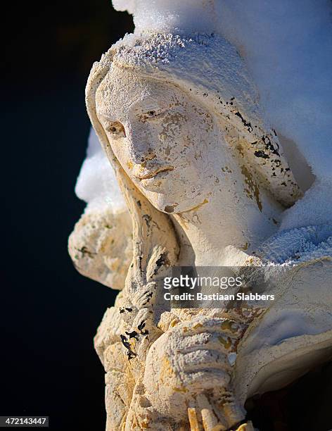 eroded garden sculpture toughed by sunlight - sistine madonna stock pictures, royalty-free photos & images
