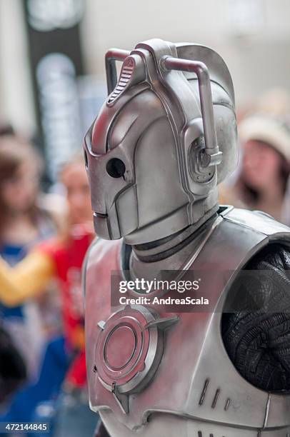 doctor who celebration 2013 - cyberman portrait - doctor saluting stock pictures, royalty-free photos & images