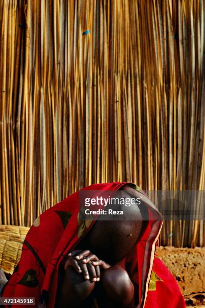 Burengue Camp, Lake Cyohoha, Rwanda. An exhausted Hutu Burundian refugee boy gets rest.